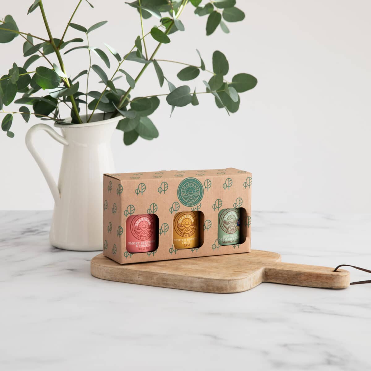 Sharpham Branded Chutney Box with three cuts outs to show the containing trio of chutneys